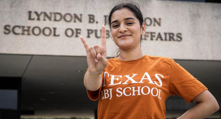 Fernanda Figueroa, LBJ School MPAff '24 student showing a hookem hand sign.